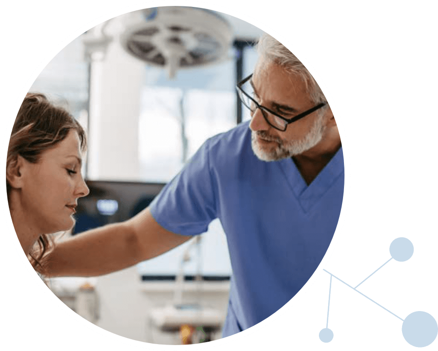 Doctor reassuring female patient